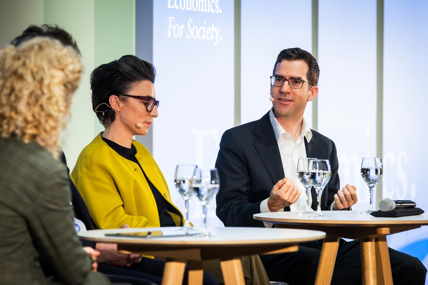 Christine Antlanger-Winter (Google Switzerland) and Prof. David Dorn (UZH) engage in a lively discussion on the economic implications of AI, ethics, and global societal challenges.